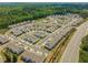 Wide aerial view of Tapp Farm showing the community layout, and surrounding green areas at 3723 Silvery Way, Powder Springs, GA 30127
