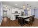 Open kitchen with island and modern appliances at 3723 Silvery Way, Powder Springs, GA 30127