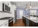 Bright kitchen with subway tile and stainless steel appliances at 3723 Silvery Way, Powder Springs, GA 30127