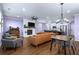 Cozy living room with hardwood floors, fireplace, and comfortable seating at 3723 Silvery Way, Powder Springs, GA 30127