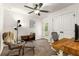 Cozy home office with a desk, comfortable chair, and plenty of natural light at 3723 Silvery Way, Powder Springs, GA 30127