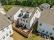 Aerial view of rear exterior featuring fenced yard and patio area at 3723 Silvery Way, Powder Springs, GA 30127