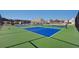 Outdoor tennis courts with green and blue surfaces offer a space for recreation and friendly competition at 3723 Silvery Way, Powder Springs, GA 30127