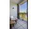Relaxing balcony with a seating area and a view of lush greenery and blue sky at 721 Longleaf Ne Dr # 3, Atlanta, GA 30342