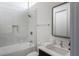 Clean bathroom featuring a shower over tub, large mirror, and a sleek single vanity at 721 Longleaf Ne Dr # 3, Atlanta, GA 30342
