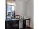 Cozy kitchenette features modern appliances, sleek black cabinetry, and ample natural light from a large window at 721 Longleaf Ne Dr # 3, Atlanta, GA 30342