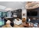 Spacious living room with hardwood floors and contemporary furnishings, leading into the modern kitchen at 721 Longleaf Ne Dr # 3, Atlanta, GA 30342