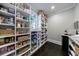 Organized walk-in pantry with lots of shelving offering ample storage space at 9675 Almaviva Dr, Alpharetta, GA 30022