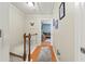 Hallway with hardwood floors leading to a bedroom at 62 Mount Vernon Cir, Atlanta, GA 30338