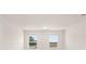 Serene bedroom with two windows offering natural light and views of the outdoors at 8605 Secretariat Dr, Lithonia, GA 30058