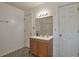 Bathroom features a single sink vanity and decorative tile flooring at 1282 Berryhill Dr, Lithonia, GA 30058