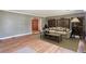 Comfortable living room featuring stylish furniture, wood floors, and ample natural light at 1282 Berryhill Dr, Lithonia, GA 30058