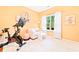 Inviting exercise room with a Peloton bike and a cozy sitting area, perfect for a home workout routine at 1996 Cobblestone Ne Cir, Atlanta, GA 30319