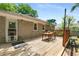 Large wooden back deck with ample space for dining and entertaining at 2486 Memorial Se Dr, Atlanta, GA 30317