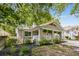 Charming bungalow with a covered porch and craftsman details at 2486 Memorial Se Dr, Atlanta, GA 30317