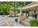 Inviting front porch with seating, a ceiling fan, and brick pillars at 2486 Memorial Se Dr, Atlanta, GA 30317