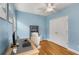 A functional office space featuring a desk, comfortable chair, and closet at 2486 Memorial Se Dr, Atlanta, GA 30317