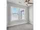 Cozy bedroom with neutral walls, carpet, and a ceiling fan, offering a peaceful retreat at 6660 Wallace Farms Dr, Cumming, GA 30028