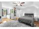 Cozy bedroom with neutral walls and ceiling fan at 209 Hearthstone Reach, Peachtree City, GA 30269