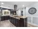 Well-equipped kitchen with stainless steel appliances, granite countertops, and stylish cabinetry at 209 Hearthstone Reach, Peachtree City, GA 30269