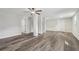 Spacious finished basement features neutral paint, wood-look floors, and white trim at 5421 Brownlee Rd, Stone Mountain, GA 30087