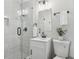 A modern bathroom featuring glass-enclosed shower and modern fixtures at 5421 Brownlee Rd, Stone Mountain, GA 30087