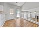 Bright dining area with sliding glass door access and view of the living area at 9511 Rollinghills Dr, Jonesboro, GA 30238