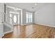 Welcoming foyer with hardwood-style floors, leading to the living area at 9511 Rollinghills Dr, Jonesboro, GA 30238