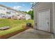 View of the backyard with a patio and storage shed at 1363 Penhurst Dr, Lawrenceville, GA 30043