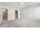 Spacious bedroom features neutral carpet, with two door ways to other rooms at 1363 Penhurst Dr, Lawrenceville, GA 30043