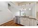 Charming kitchen featuring stainless steel appliances, granite counters, and hardwood floors at 1363 Penhurst Dr, Lawrenceville, GA 30043