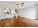 Spacious living room merges seamlessly with the kitchen, complete with an adjacent staircase at 1363 Penhurst Dr, Lawrenceville, GA 30043