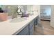 Bright bathroom featuring a spacious vanity, modern fixtures, and neutral tones at 260 Ruby Forest Pkwy, Suwanee, GA 30024