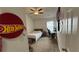 This bedroom features a ceiling fan, neutral carpet, and a comfortable bed, offering a serene and inviting space at 51 Freedom Ne Dr, Cartersville, GA 30121