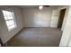 Empty bedroom with carpet and a window at 51 Freedom Ne Dr, Cartersville, GA 30121