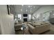 Open-concept living room features high ceilings, a fireplace, a large sectional sofa, and unique decorative elements at 51 Freedom Ne Dr, Cartersville, GA 30121