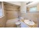 Nicely renovated bathroom with a tub, shower and granite vanity at 1443 Snapfinger Rd, Decatur, GA 30032