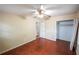 Bedroom includes a ceiling fan, closet and attached full bathroom at 1443 Snapfinger Rd, Decatur, GA 30032