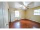 Bedroom with ceiling fan and two large windows provides lots of natural light at 1443 Snapfinger Rd, Decatur, GA 30032