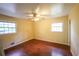 Bedroom with two windows, a ceiling fan and closet at 1443 Snapfinger Rd, Decatur, GA 30032