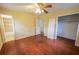 Bedroom with ensuite bath, closet and hardwood flooring at 1443 Snapfinger Rd, Decatur, GA 30032