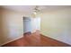 This bedroom has a ceiling fan, closet and access to an adjacent room at 1443 Snapfinger Rd, Decatur, GA 30032