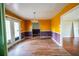 Dining room featuring hardwood floors, and a view through to the kitchen at 1443 Snapfinger Rd, Decatur, GA 30032