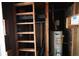 Utility room with shelving and hot water tank at 1443 Snapfinger Rd, Decatur, GA 30032