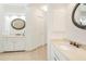 Bright bathroom with dual vanities, granite counters, and decorative mirrors at 1915 Milfield Cir, Snellville, GA 30078