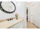 Bright bathroom with a granite vanity, decorative mirror and tile floors at 1915 Milfield Cir, Snellville, GA 30078