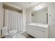 Bathroom featuring a tub and shower combination with a stylish vanity and mirror at 2350 Twelvestones Dr, Roswell, GA 30076