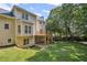Exterior of home with deck, patio, and spacious backyard at 2350 Twelvestones Dr, Roswell, GA 30076