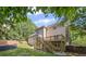 Exterior of home with deck and outdoor space at 2350 Twelvestones Dr, Roswell, GA 30076