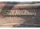 Community sign with 'Twelvestones' on a brick wall at 2350 Twelvestones Dr, Roswell, GA 30076